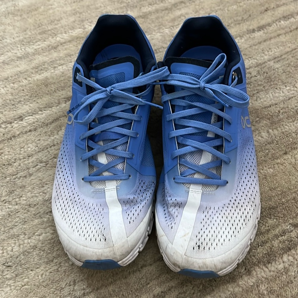 On blue and white sneakers